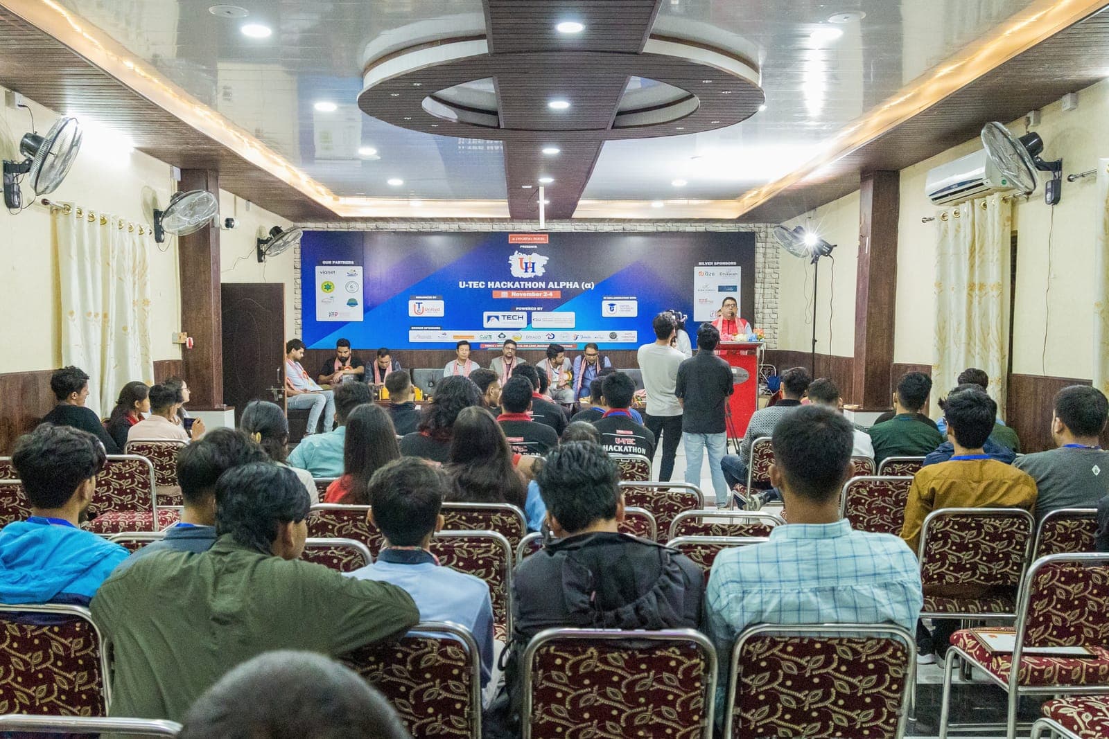Participants in the hall during the U-TEC Hackathon Alpha closing ceremony