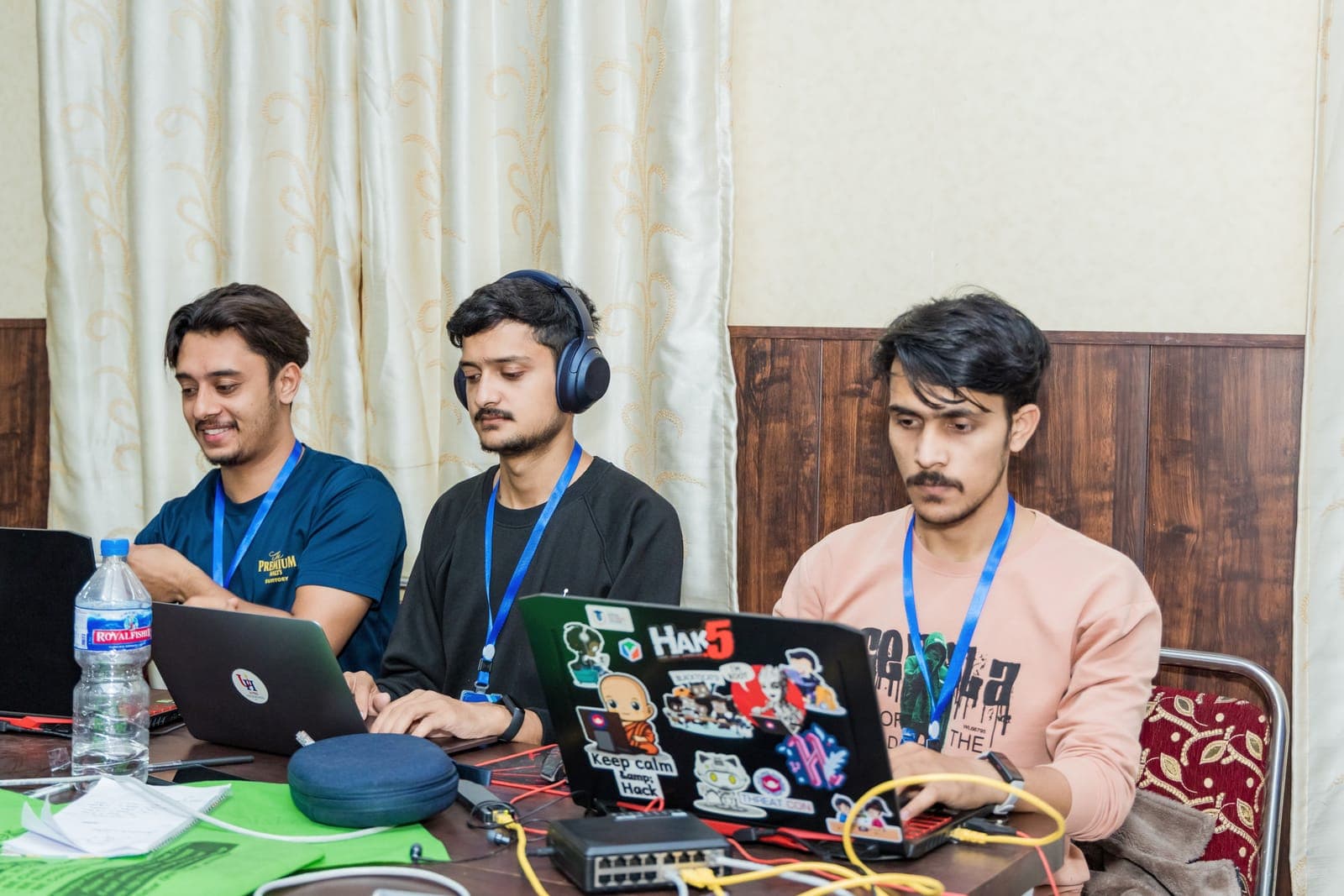 A team coding through the night at U-TEC Hackathon Alpha