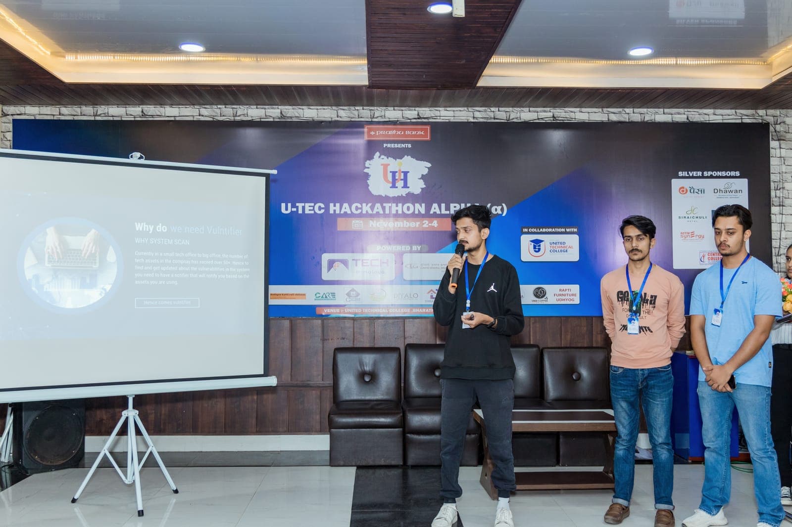 A team presenting their solution at U-TEC Hackathon Alpha