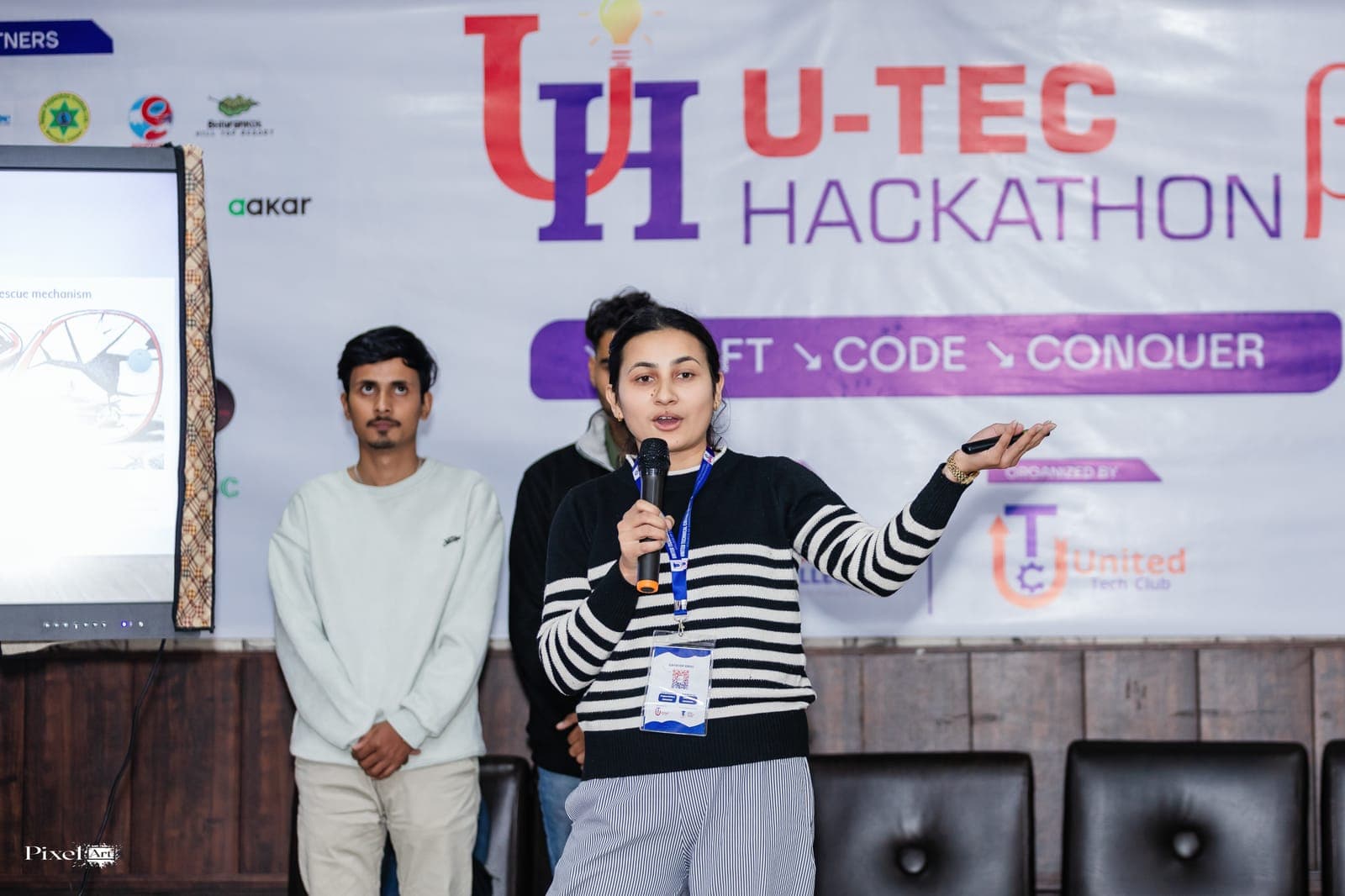 A team presenting their project at U-TEC Hackathon Beta