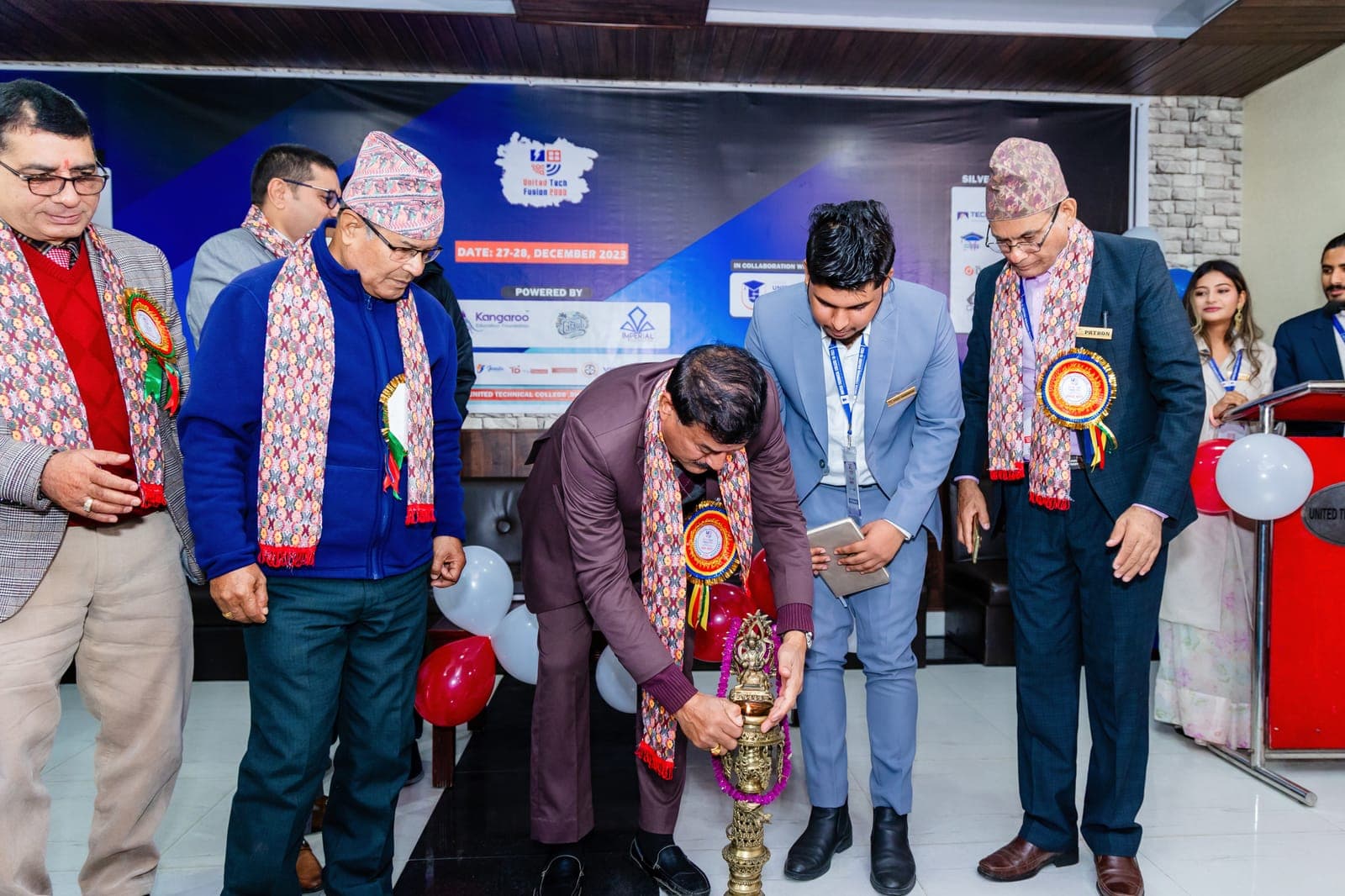 Guests lighting the lamp at the opening of United Tech Fusion 2080