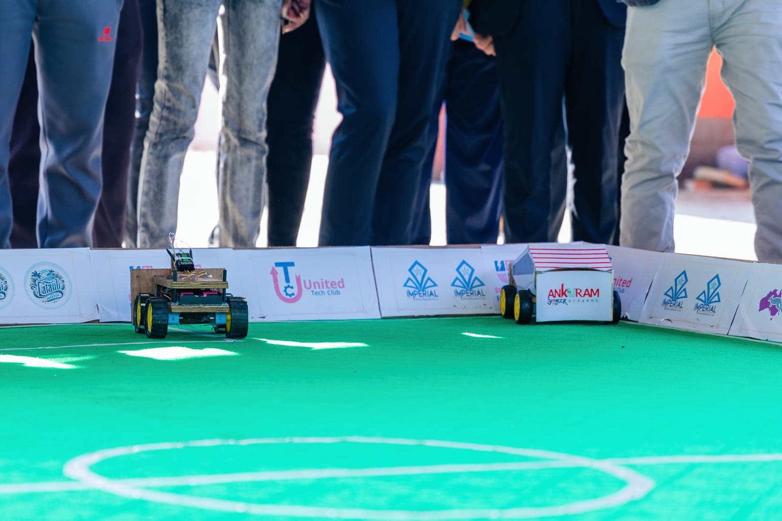 Robots competing in the robot soccer match at United Tech Fusion 2080