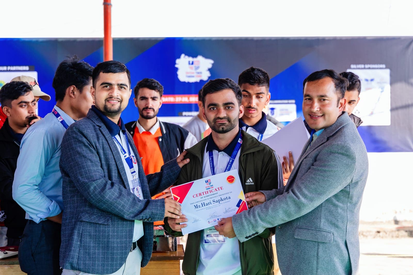 A team receiving their certificate at United Tech Fusion 2080