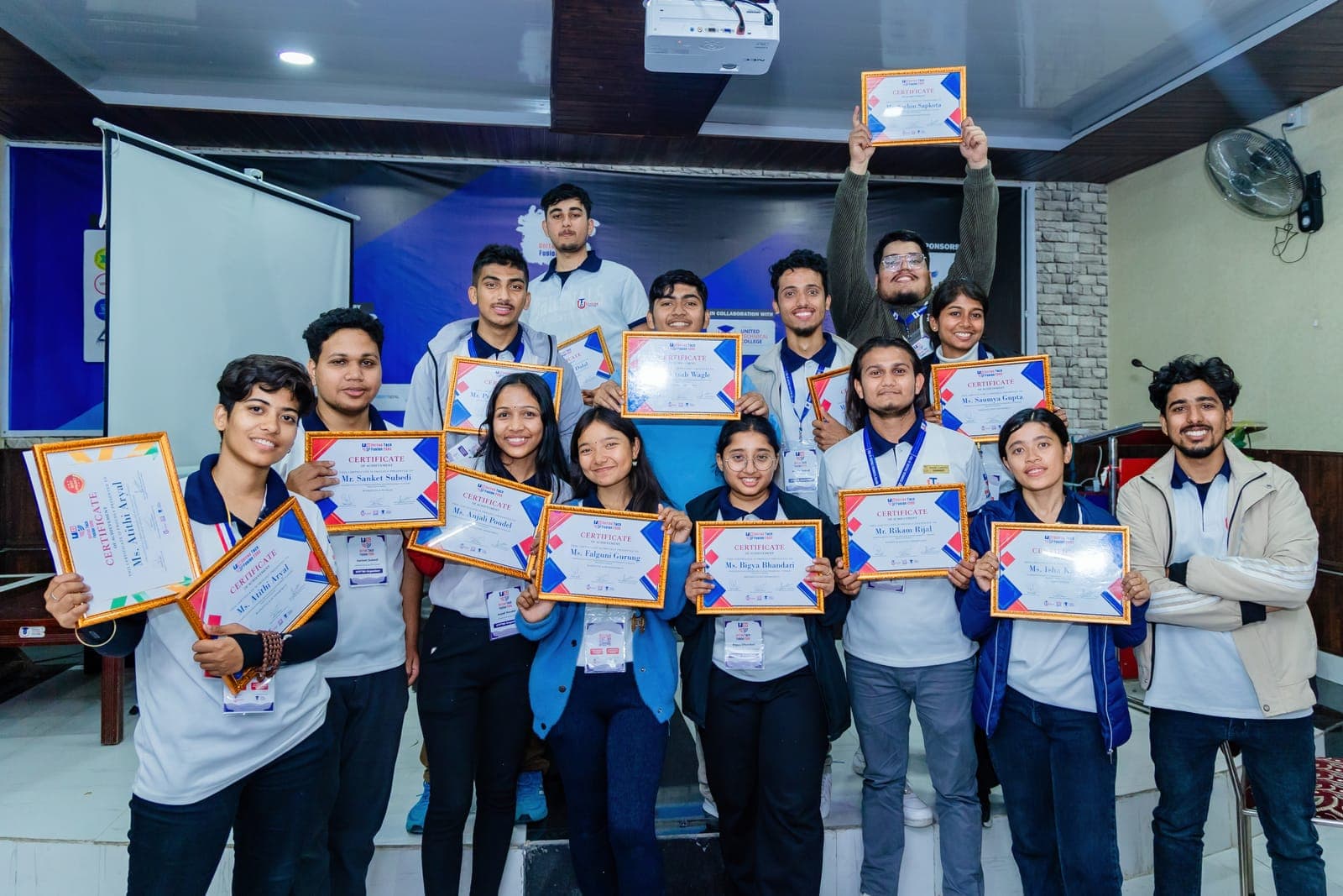 Participants holding their certificates at United Tech Fusion 2080