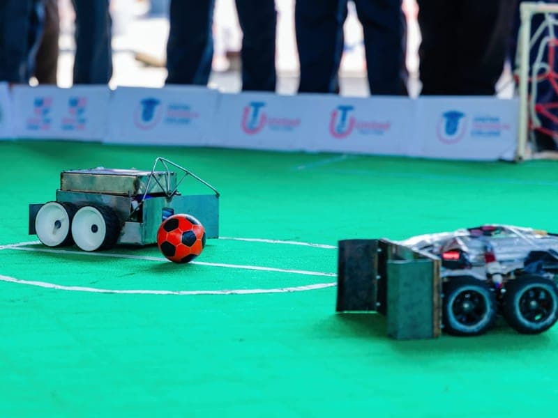 Student-built robots playing robot soccer